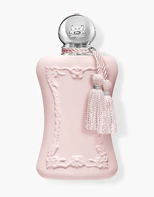 Parfums de Marly Delina pink perfume bottle with decorative cap and tassel on a white background