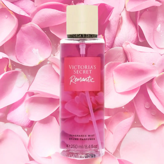 Victoria's Secret Romantic fragrance mist bottle on pink flower petals
