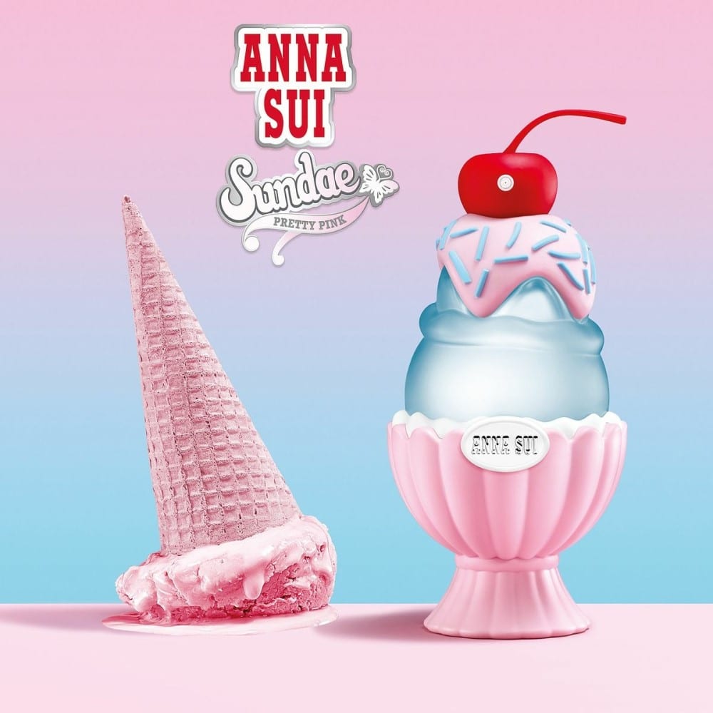 Anna Sui ice cream-themed perfume bottle with pink and blue design on a pastel background