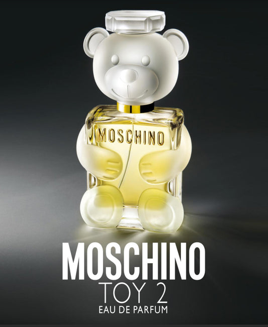 Moschino Toy 2 perfume bottle with bear design on a dark background