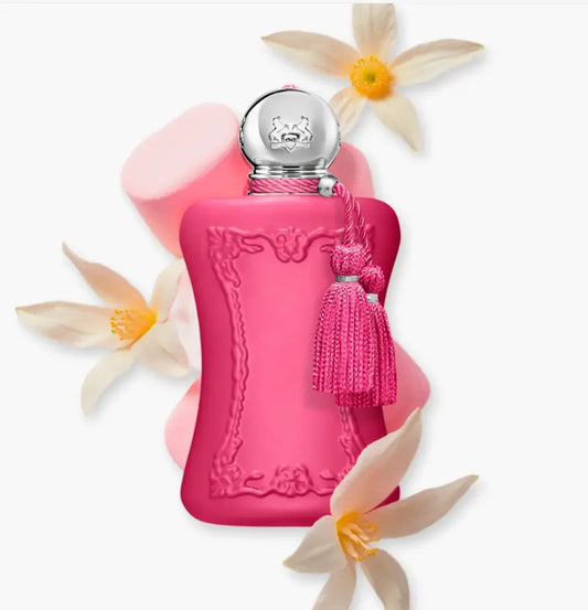 Pink perfume bottle with decorative elements on a white background