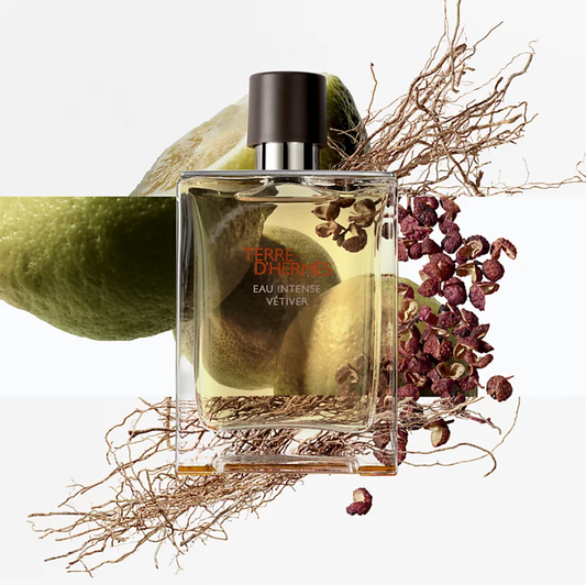 Perfume bottle with natural elements on a white background