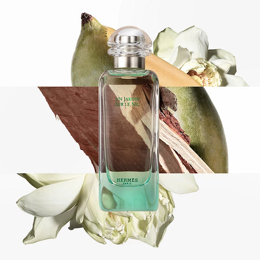 Hermes perfume bottle with floral and wooden background