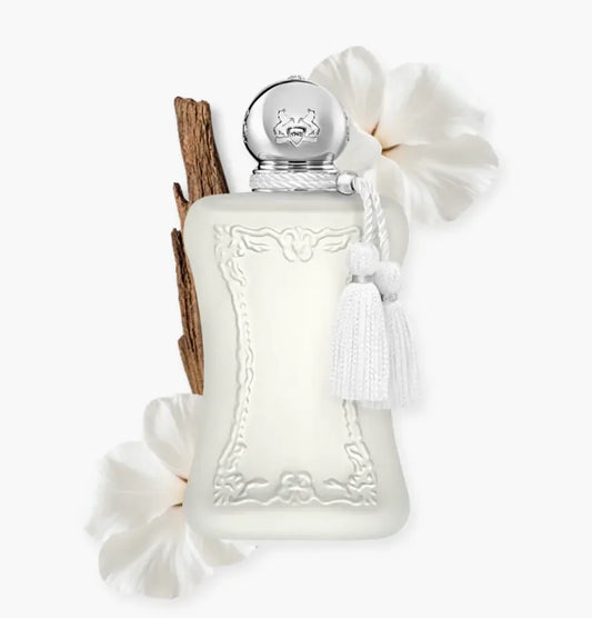White perfume bottle with decorative elements on a white background