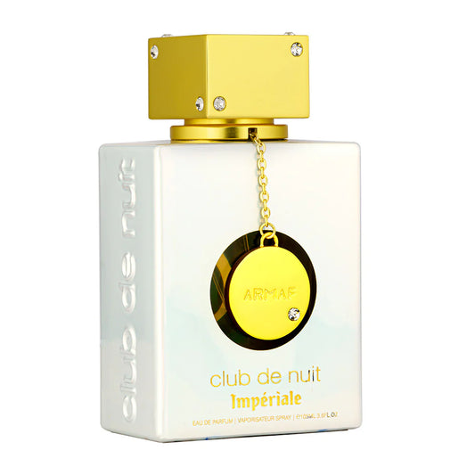 Perfume bottle with gold cap and label on a white background