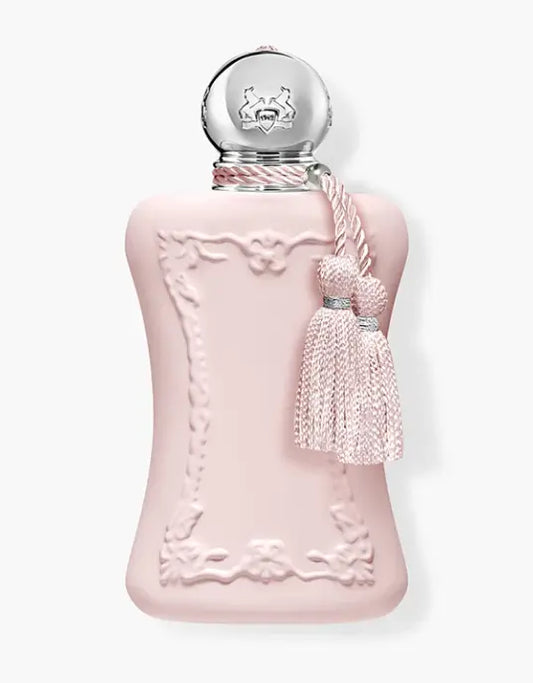 Parfums de Marly Delina pink perfume bottle with decorative cap and tassel on a white background