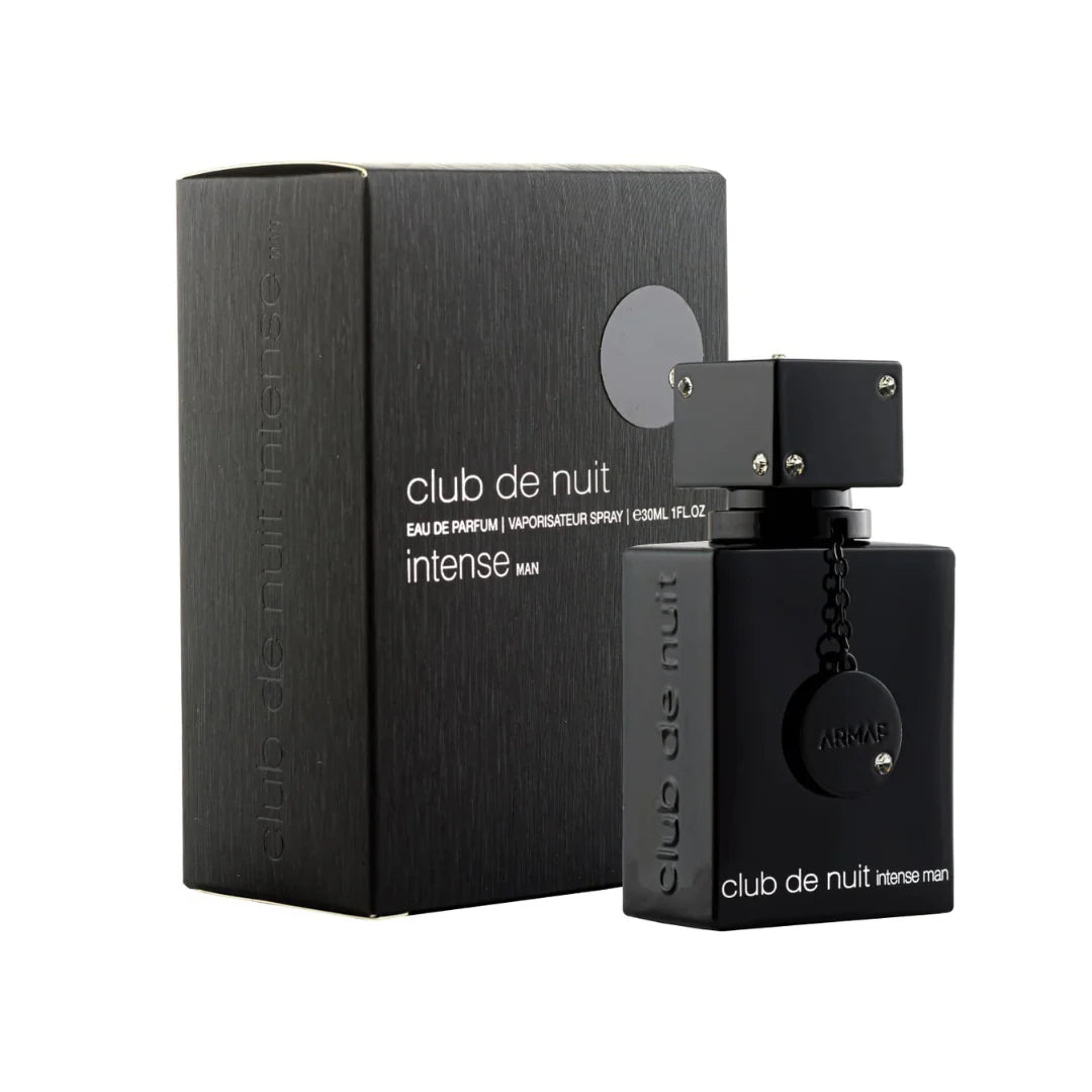 Black 'club de nuit intense' perfume bottle and packaging on a white background