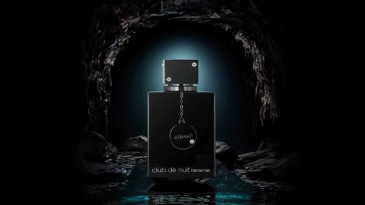 Black perfume bottle with a chain on a dark background