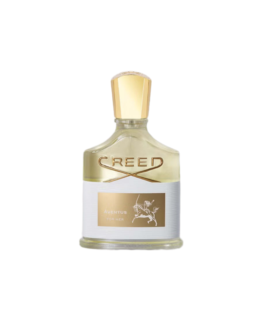 Creed perfume bottle with gold cap and label on a white background