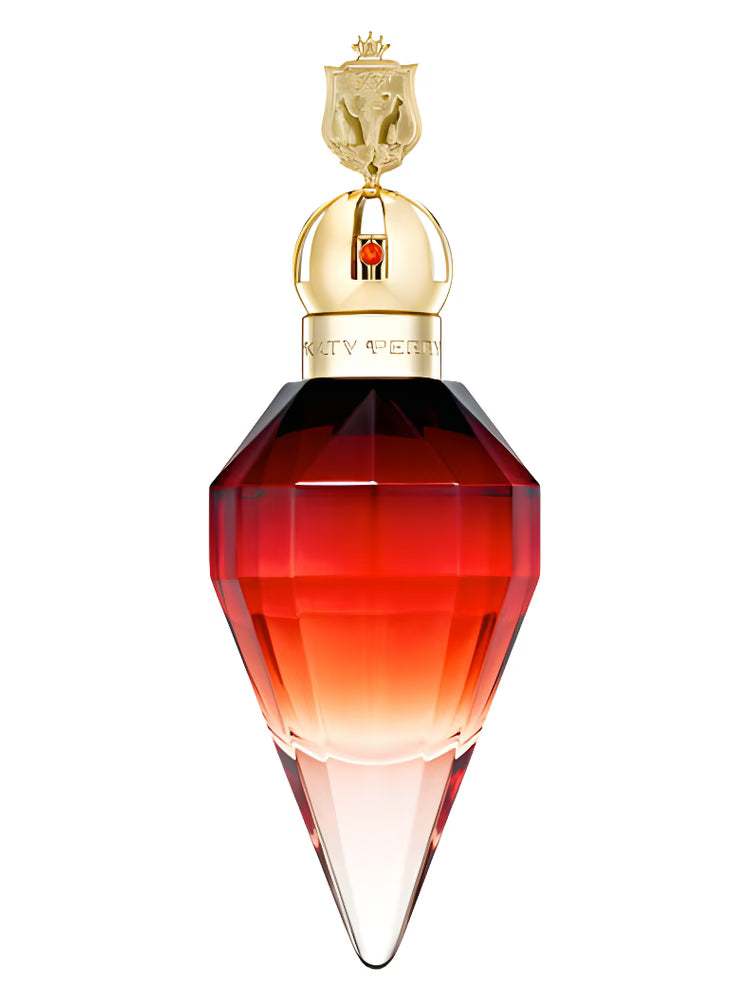 Red and gold perfume bottle with a decorative cap on a white background